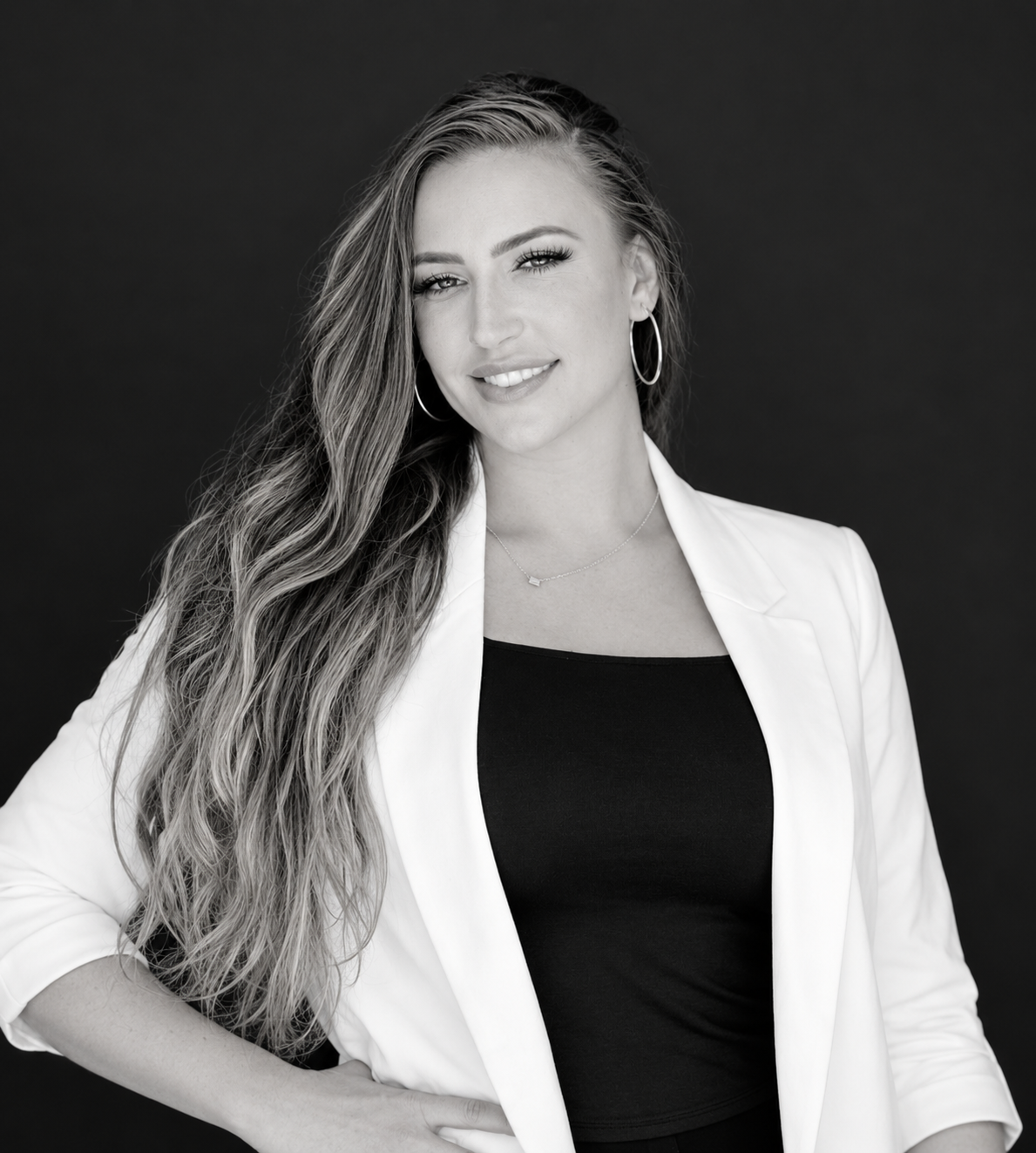Sandra Appel, FNP-C, in a white jacket